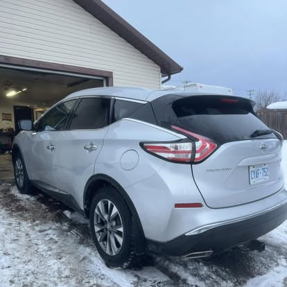 SUV exterior before and after wash, after